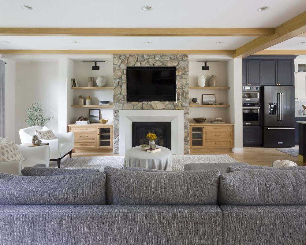 Custom luxury living room with natural light and tv built-ins