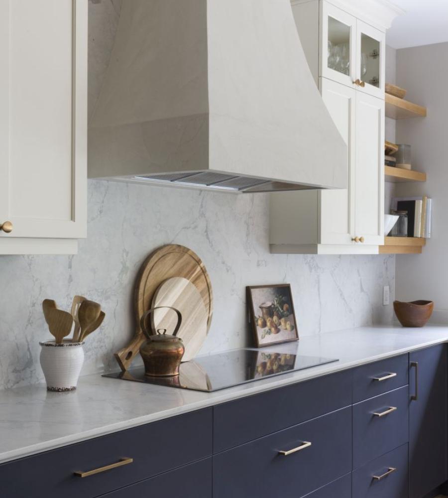 Cement board custom rangehood with painted cabinets
